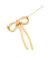Metal ribbon brooch