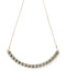A curved line necklace with strings of chic colored pearls