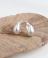 Matte metal curled earrings