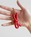 Leather-like ribbon charm