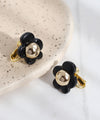 Metal and clear flower earrings