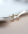 Cross Line Hoop Earrings