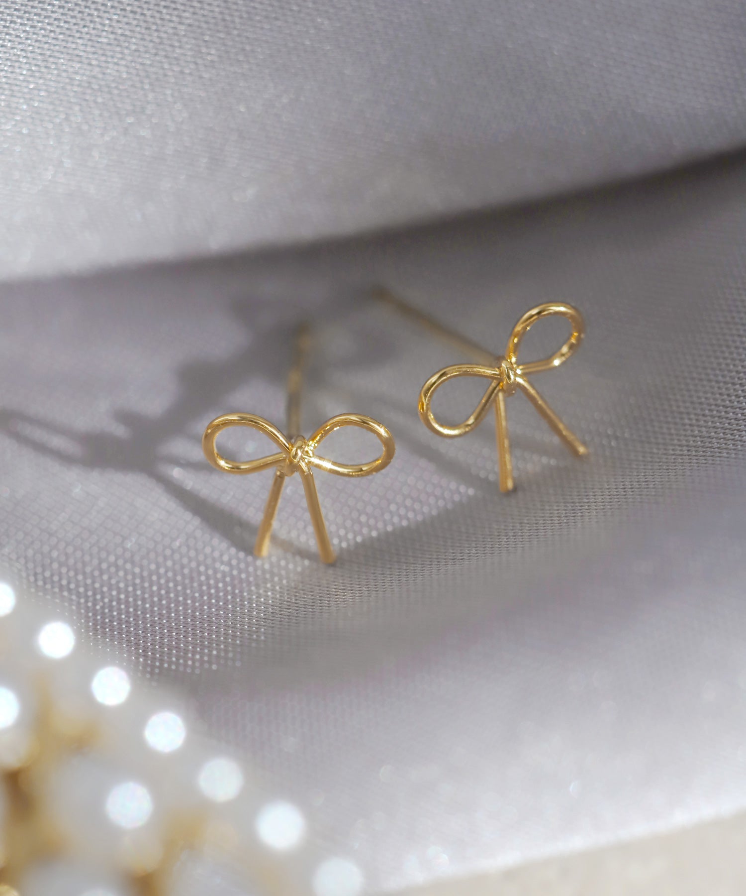 ANEMONE】ミニリボンメタルピアス[K18ポスト]｜SANPO ONLINE(サンポー