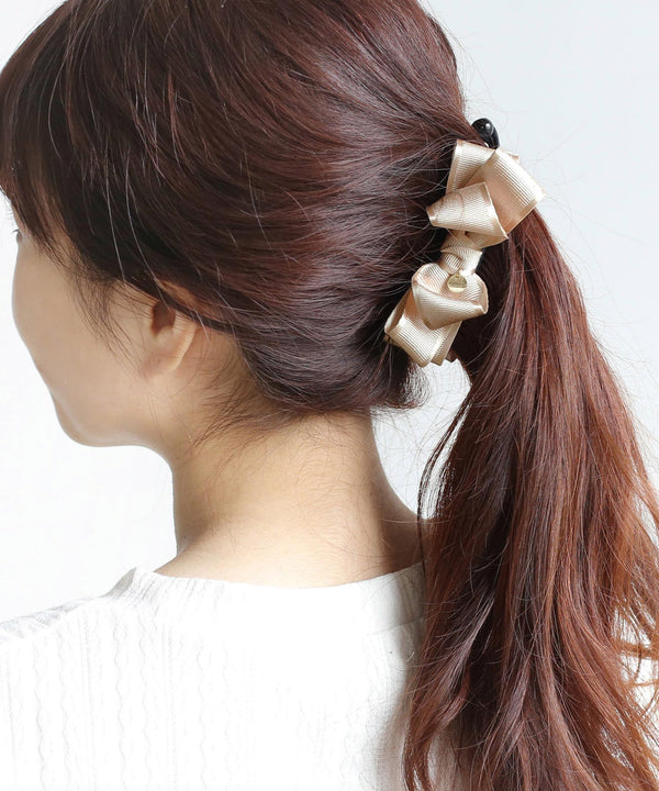 Piping volume ribbon banana clip