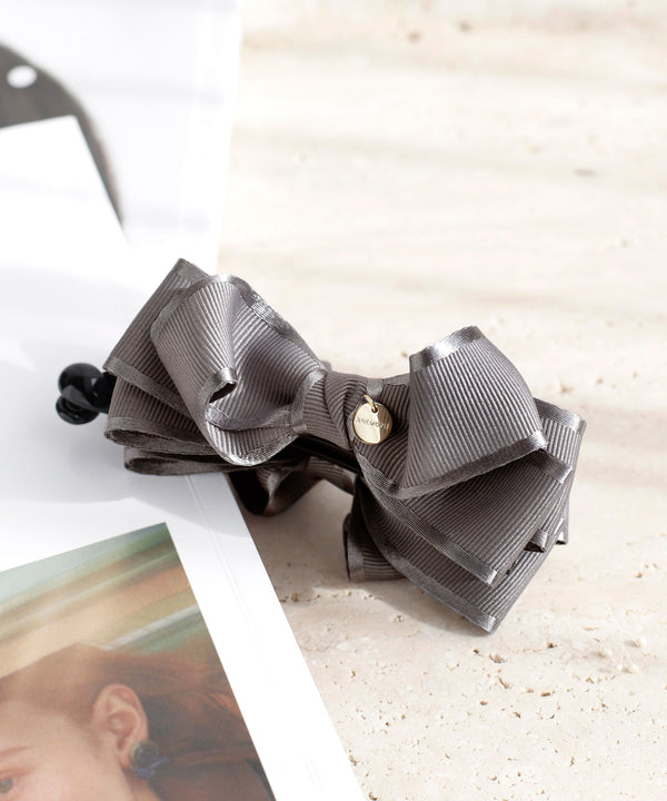 パイピングボリュームリボンのバナナクリップ