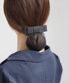 Overlapping ribbon chignon net