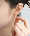 パール×ウェーブメタルフックピアス
