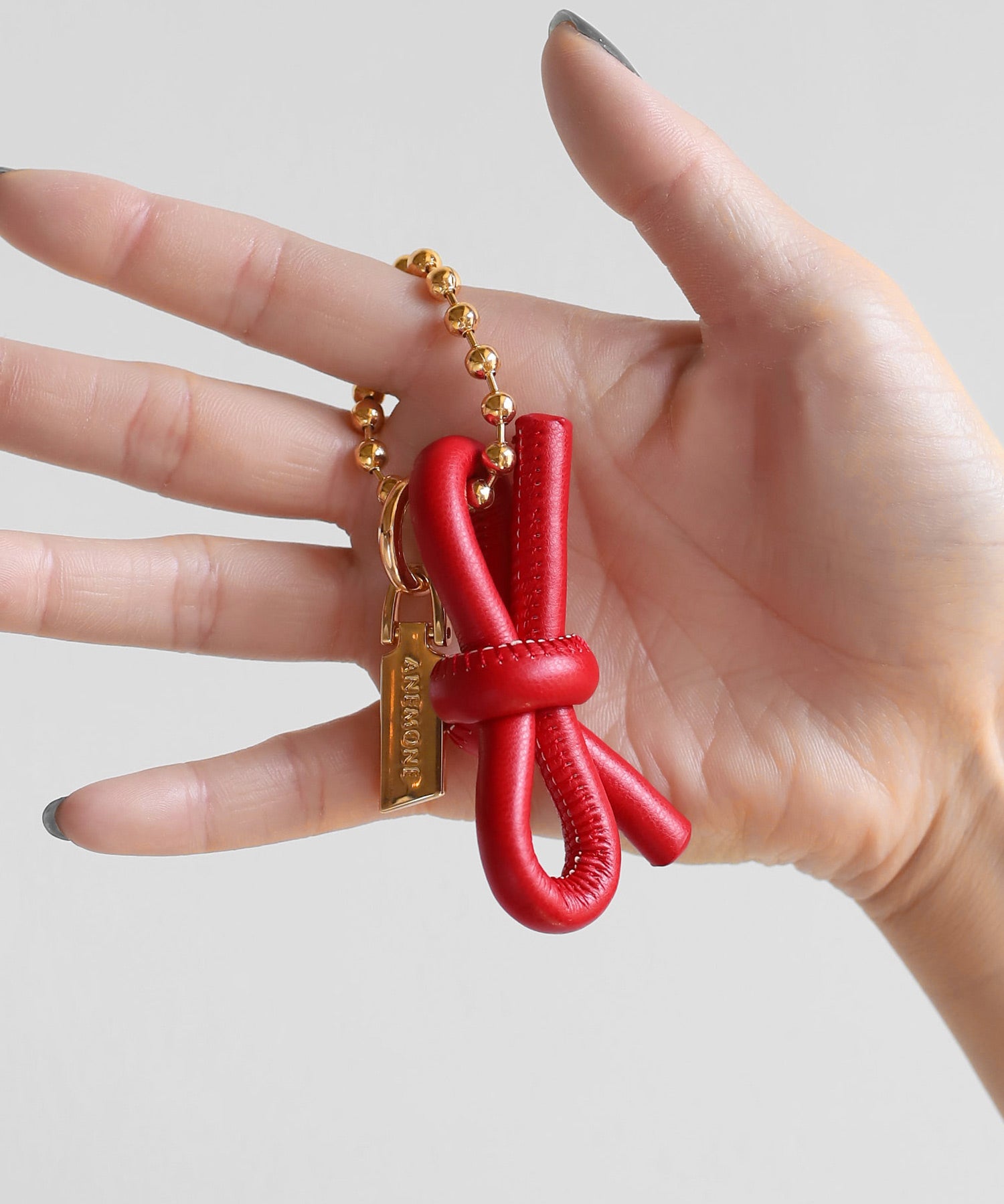 ANEMONE】レザー調リボンチャーム｜アネモネ・シエナロゼ・ミミサン