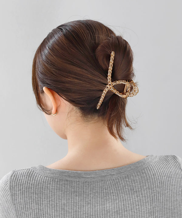 Suede and metal loop vance