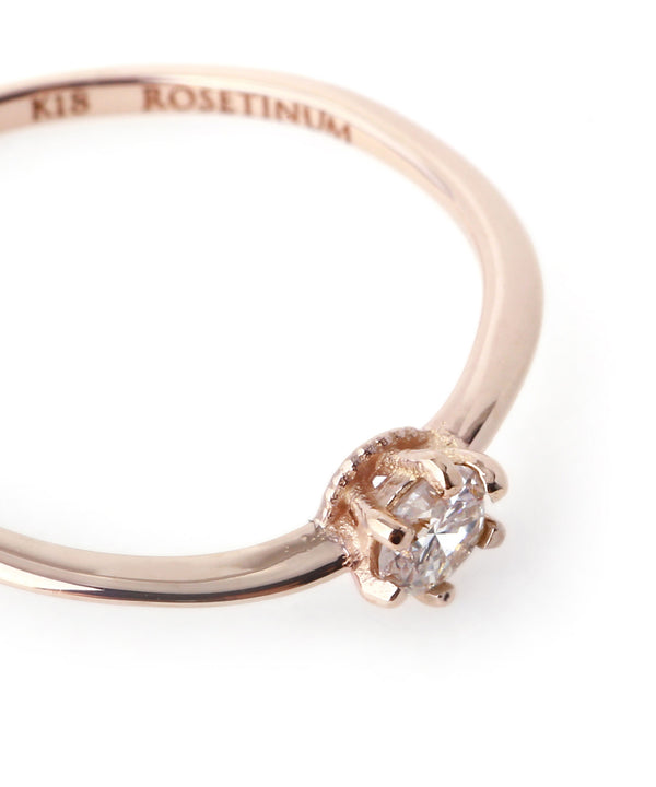 Twisted line single diamond ring