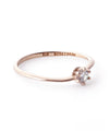 Twisted line single diamond ring